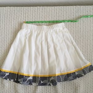 LILLY OF BEVERY HILLS WHITE PLEATED SKIRT WITH YELLOW AND BLACK BOTTOM, SIZE 4